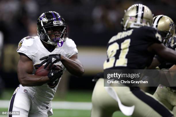 Bobby Rainey of the Baltimore Ravens in action against the New Orleans Saints at Mercedes-Benz Superdome on August 31, 2017 in New Orleans, Louisiana.