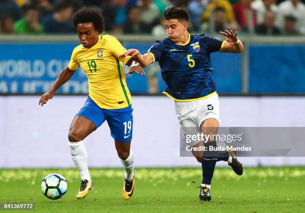 Willian of Brazil struggles for the ball with Fernando Gaibor of Ecuador during a match between Brazil and Ecuador as part of 2018 FIFA World Cup...