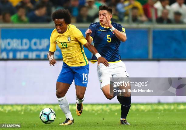 Willian of Brazil struggles for the ball with Fernando Gaibor of Ecuador during a match between Brazil and Ecuador as part of 2018 FIFA World Cup...