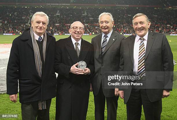 Nobby Stiles is presented with a Contribution to Football award by the Manchester FA ahead of the Barclays Premier League match between Manchester...