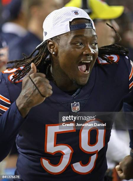 Danny Trevathan of the Chicago Bears celebrates a teammates play against the Cleveland Browns during a preseason game at Soldier Field on August 31,...
