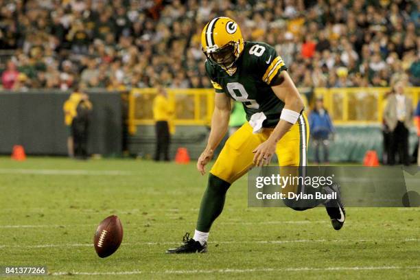 Taysom Hill of the Green Bay Packers chases after a loose ball in the fourth quarter against the Los Angeles Rams during a preseason game at Lambeau...