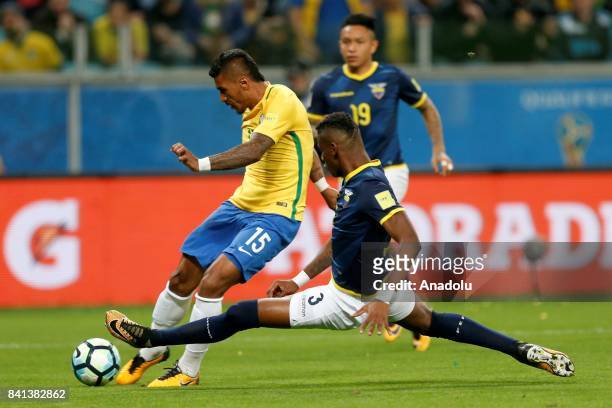 Paulinho of Brazil in action against Robert Arboleda of Ecuador during the 2018 FIFA World Cup Russia qualifying match between Brazil and Ecuador at...