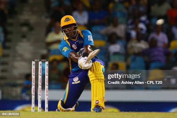 In this handout image provided by CPL T20, Dwayne Smith of Barbados Tridents hits a six during Match 25 of the 2017 Hero Caribbean Premier League...