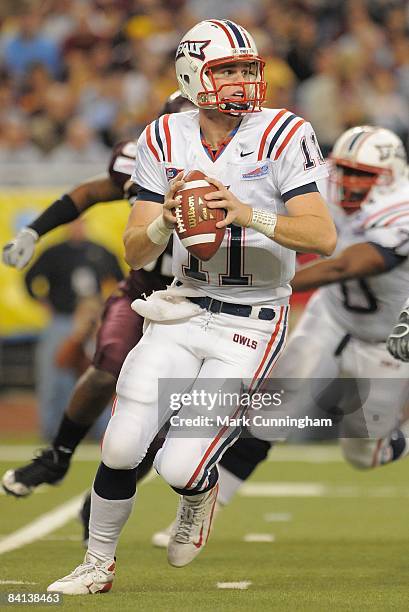 Rusty Smith of the Florida Atlantic University Owls looks to pass against the Central Michigan Chippewas during the 2008 Motor City Bowl at Ford...