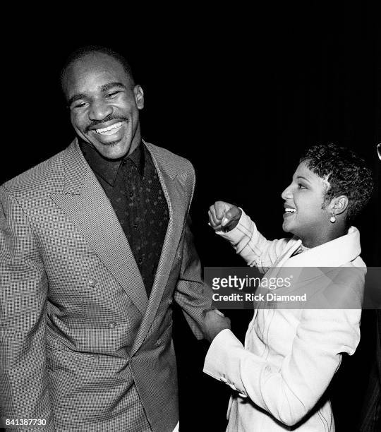 Boxing Champion Evander "The Real Deal" Holyfield and Singer/Songwriter Toni Braxton attend LaFace Records Toni Braxton platinum celebration party in...