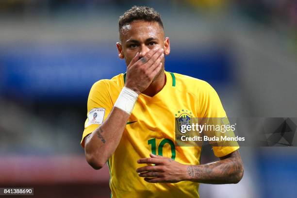 Neymar of Brazil reacts during a match between Brazil and Ecuador as part of 2018 FIFA World Cup Russia Qualifier at Arena do Gremio on August 31,...