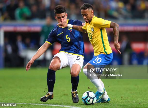 Neymar of Brazil struggles for the ball with Fernando Gaibor of Ecuador during a match between Brazil and Ecuador as part of 2018 FIFA World Cup...