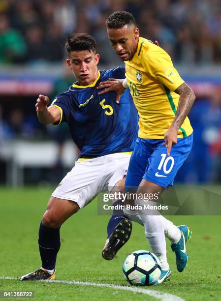 Neymar of Brazil struggles for the ball with Fernando Gaibor of Ecuador during a match between Brazil and Ecuador as part of 2018 FIFA World Cup...