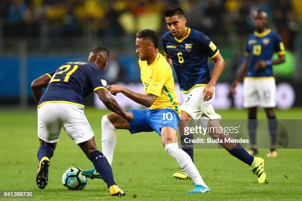 Neymar of Brazil struggles for the ball with Gabriel Achilier of Ecuador during a match between Brazil and Ecuador as part of 2018 FIFA World Cup...