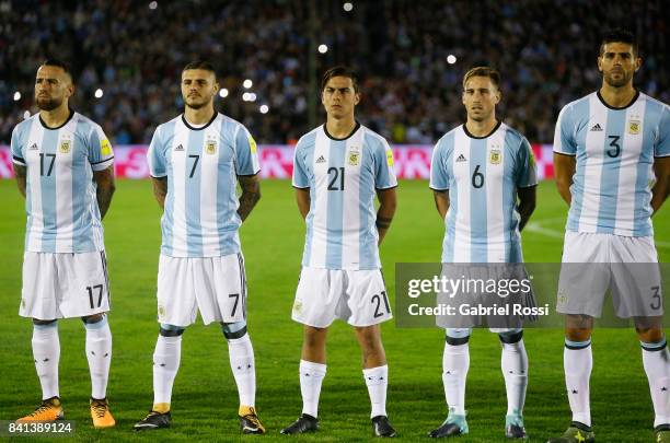 Nicolas Otamendi, Mauro Icardi, Paulo Dybala, Lucas Biglia and Federico Fazio of Argentina line up for the National Anthem prior to a match between...