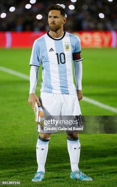 Lionel Messi of Argentina stands for the National Anthem prior a match between Uruguay and Argentina as part of FIFA 2018 World Cup Qualifiers at...