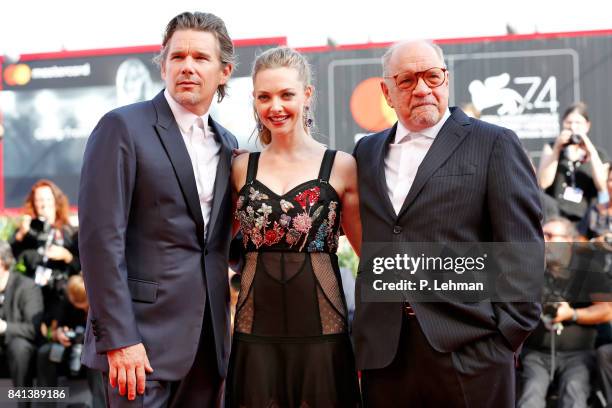 Ethan Hawke, Amanda Seyfried and Paul Schrader attend the 'First Reformed' premiere during the 74th Venice Film Festival on August 31, 2017 in...