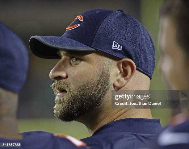 Kyle Long of the Chicago Bears is seen on the sidelines during a preseason game against the Cleveland Browns at Soldier Field on August 31, 2017 in...