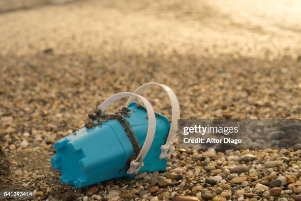 two cubes one inside the other at the beach. - innere ruhe und blau stock-fotos und bilder