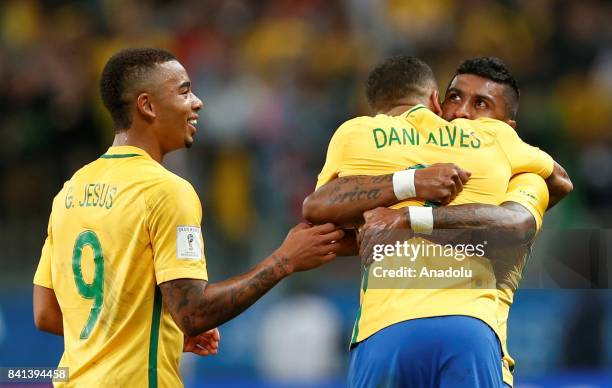 Paulinho of Brazil celebrates with his teammates after scoring a goal during the 2018 FIFA World Cup Russia qualifying match between Brazil and...