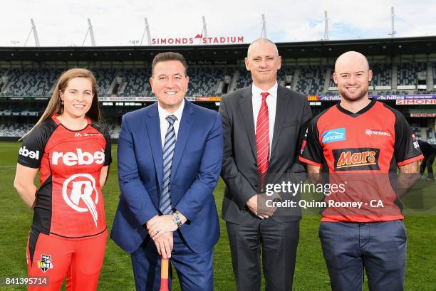 Sophie Molineux of the Renegades, Sports Minister John Eren, Renegades CEO Stuart Coventry and Tim Ludeman of the Renegades pose during a Melbourne...