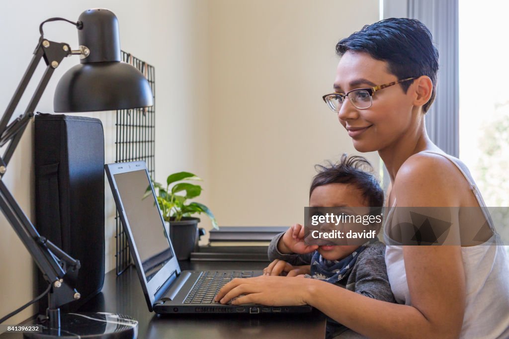 Australian Aboriginal Mother at Computer