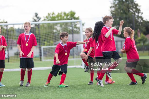 kids practicing soccer at camp - fat soccer players stock pictures, royalty-free photos & images