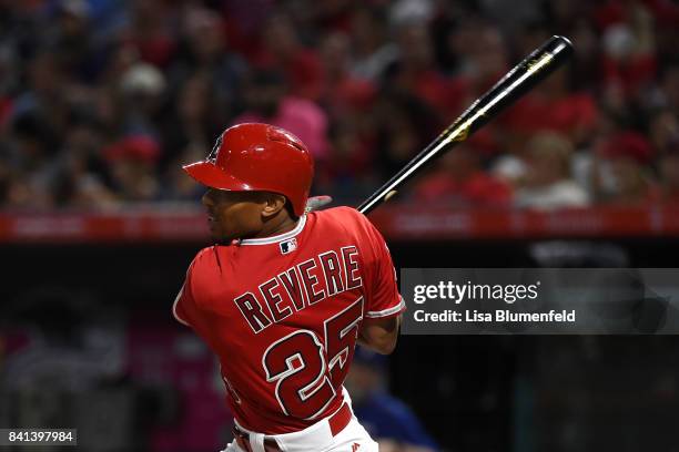 Ben Revere of the Los Angeles Angels of Anaheim hits a single in the second inning against the Texas Rangers at Angel Stadium of Anaheim on August...