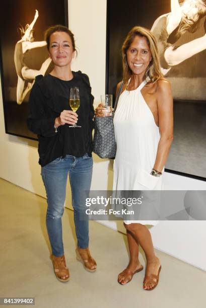 Presenter AudreyTinthoin and TV presenter/actress Rachel Bourlier attend 'Bolchoi' Vincent Perez Photo Exhibition Preview at Royal Monceau on August...