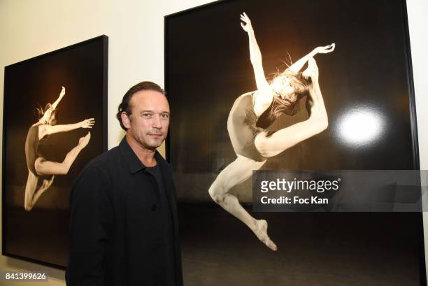 Actor/photographer Vincent Perez poses with his work during 'Bolchoi' Vincent Perez Photo Exhibition Preview at Royal Monceau on August 31, 2017 in...