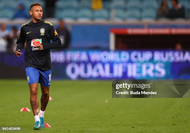 Neymar of Brazil warms up before a match between Brazil and Ecuador as part of 2018 FIFA World Cup Russia Qualifier at Arena do Gremio on August 31,...