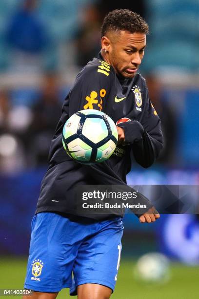 Neymar of Brazil warms up before a match between Brazil and Ecuador as part of 2018 FIFA World Cup Russia Qualifier at Arena do Gremio on August 31,...