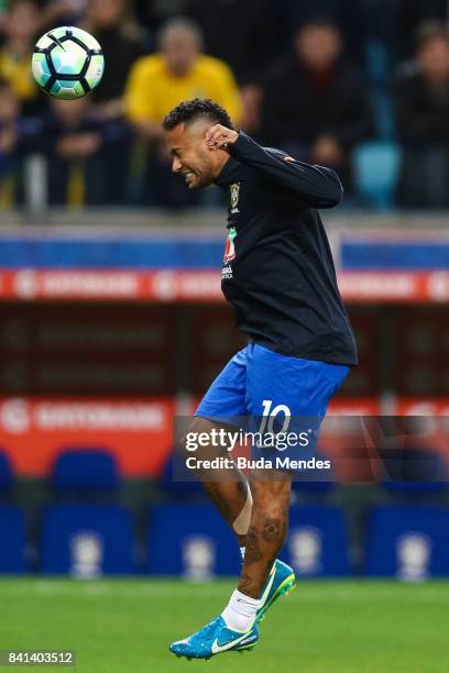 Neymar of Brazil warms up before a match between Brazil and Ecuador as part of 2018 FIFA World Cup Russia Qualifier at Arena do Gremio on August 31,...