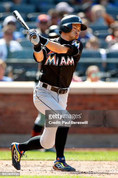 Ichiro Suzuki of the Miami Marlins strikes out swinging in an MLB baseball game against the New York Mets on August 20, 2017 at CitiField in the...
