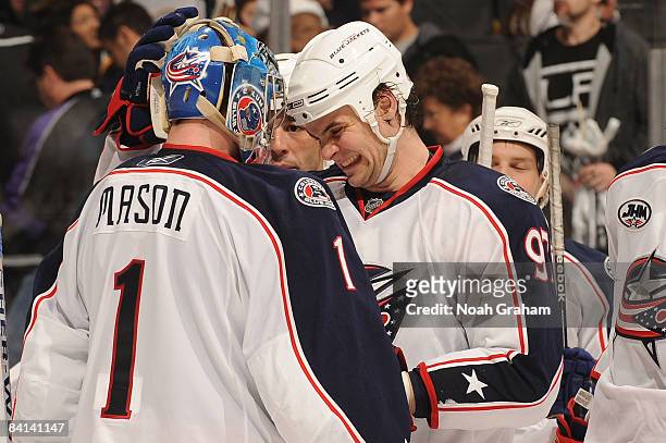 Steve Mason is congratulated by teammate Rostislav Klesla of the Columbus Blue Jackets for a 2-1 shutout against the Los Angeles Kings on December...
