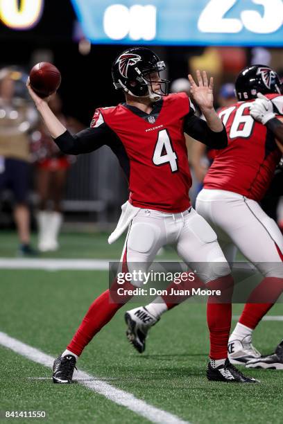 Quarterback Matt Simms of the Atlanta Falcons on a pass play during a preseason game against the Jacksonville Jaguars at Mercedes-Benz Stadium on...