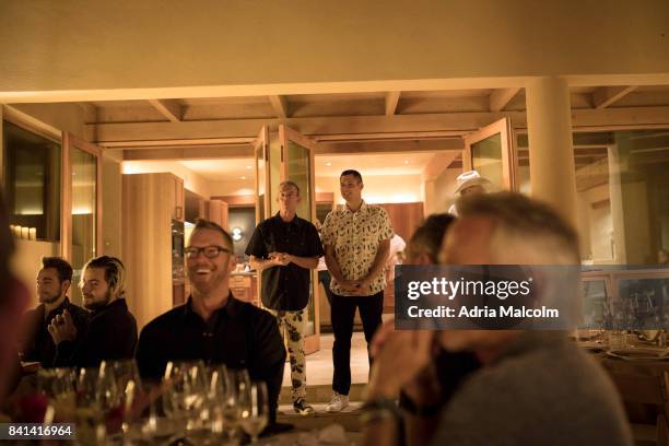 Elvis Duran and Alex Carr speak to guests at The Burning of Zozobra Pre-event Dinner hosted by the Elvis Duran at his new home in honor of Mayor...