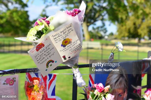 Tribute on the Golden Gates of Kensington Palace, ahead of the 20th anniversary of Princess Diana's death, London on August 31, 2017. People gathered...