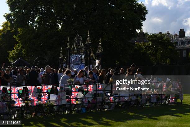 Tribute on the Golden Gates of Kensington Palace, ahead of the 20th anniversary of Princess Diana's death, London on August 31, 2017. People gathered...
