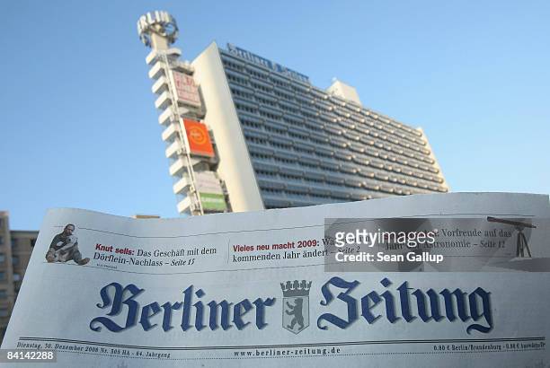 Copy of Berlin daily newspape, "Berliner Zeitung" is seen in front of the headquarters of its parent publisher, Berliner Verlag, in this photo...