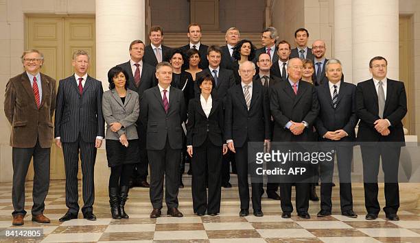 The new Belgian government are pictured with newly appointed Prime Minister Herman Van Rompuy , and King Albert II of Belgium, at the Royal Palace in...