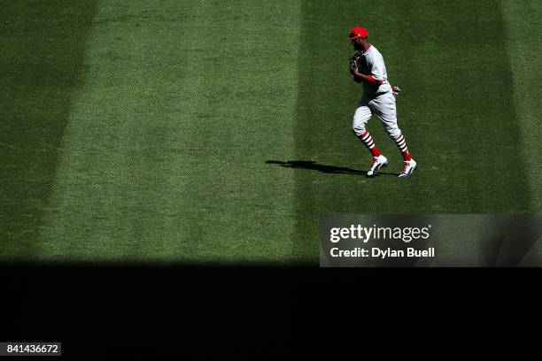 Dexter Fowler of the St. Louis Cardinals jogs off the field after the sixth inning against the Milwaukee Brewers at Miller Park on August 30, 2017 in...