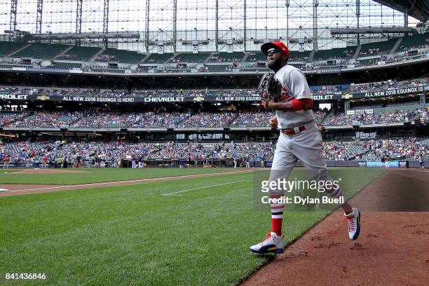 Dexter Fowler of the St. Louis Cardinals jogs onto the field before the game against the Milwaukee Brewers at Miller Park on August 30, 2017 in...