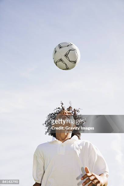 young boy playing soccer - header stock pictures, royalty-free photos & images