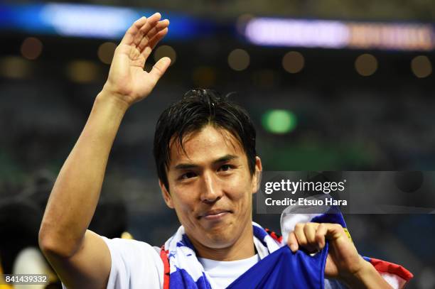 Makoto Hasebe of Japan celebrate their 2-0 victory and qualified for the FIFA World Cup Russia after the FIFA World Cup Qualifier match between Japan...