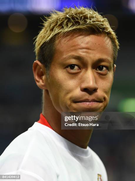 Keisuke Honda of Japan celebrates their 2-0 victory and qualified for the FIFA World Cup Russia after the FIFA World Cup Qualifier match between...