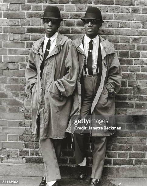 Chuka and Dubem, twins from Islington, wearing the rude boy fashion - trilby hats, braces, sunglasses, and skinny ties in London, 1979.