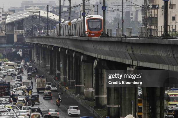 Train travels along a section of elevated track on Line 1, operated by the Mumbai Metro One Pvt. , a joint venture controlled by Reliance Industries...