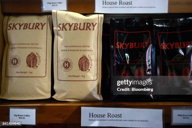 Bags Skybury coffee sit on a shelf at the Skybury Coffee Pty coffee plantation in the Atherton Tablelands, Queensland, Australia, on Tuesday, Aug. 1,...