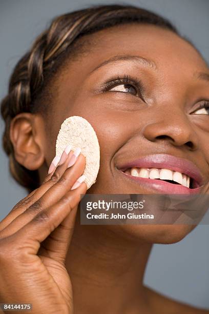 woman cleaning face. - cotton pad stock pictures, royalty-free photos & images