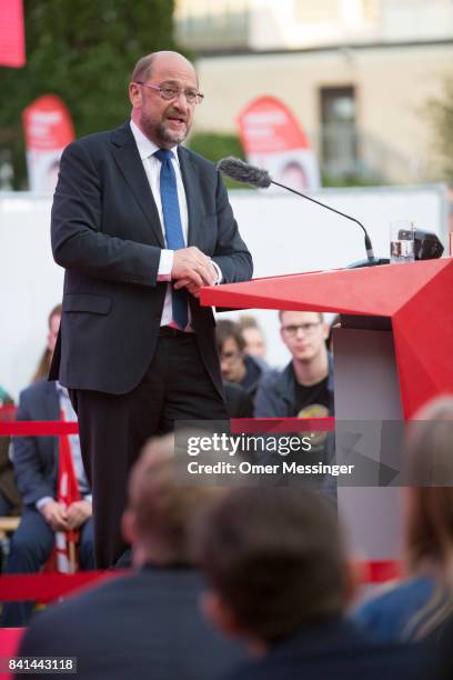 Martin Schulz, chancellor candidate of the German Social Democrats , speaks to voters at a "Martin Schulz live" election campaign stop on August 31,...