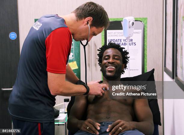 Wilfried Bony is examined by team doctor Jez McCluskey during his medical at the Swansea City FC Fairwood Training Ground on August 31, 2017 in...