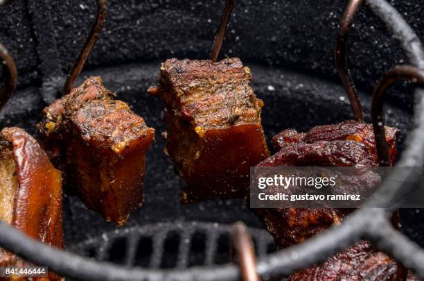 traditional chancho al cilindro peruvian food - chancho stockfoto's en -beelden