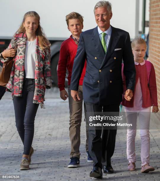 Princess Elisabeth of Belgium, Prince Gabriel of Belgium, King Philippe of Belgium and Princess Eleonore of Belgium arrive at the St John Bergmans...